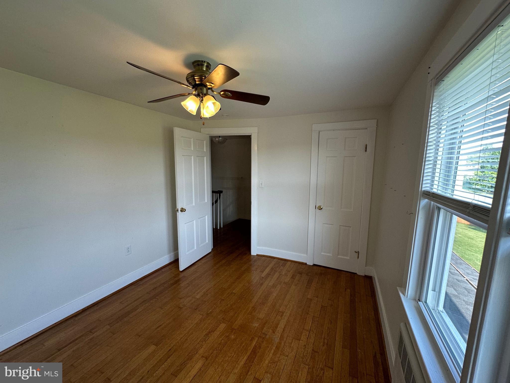2 Terrace Lane Luray, VA 22835 - Photo 31 of 35 a view of an empty room with wooden floor and a window