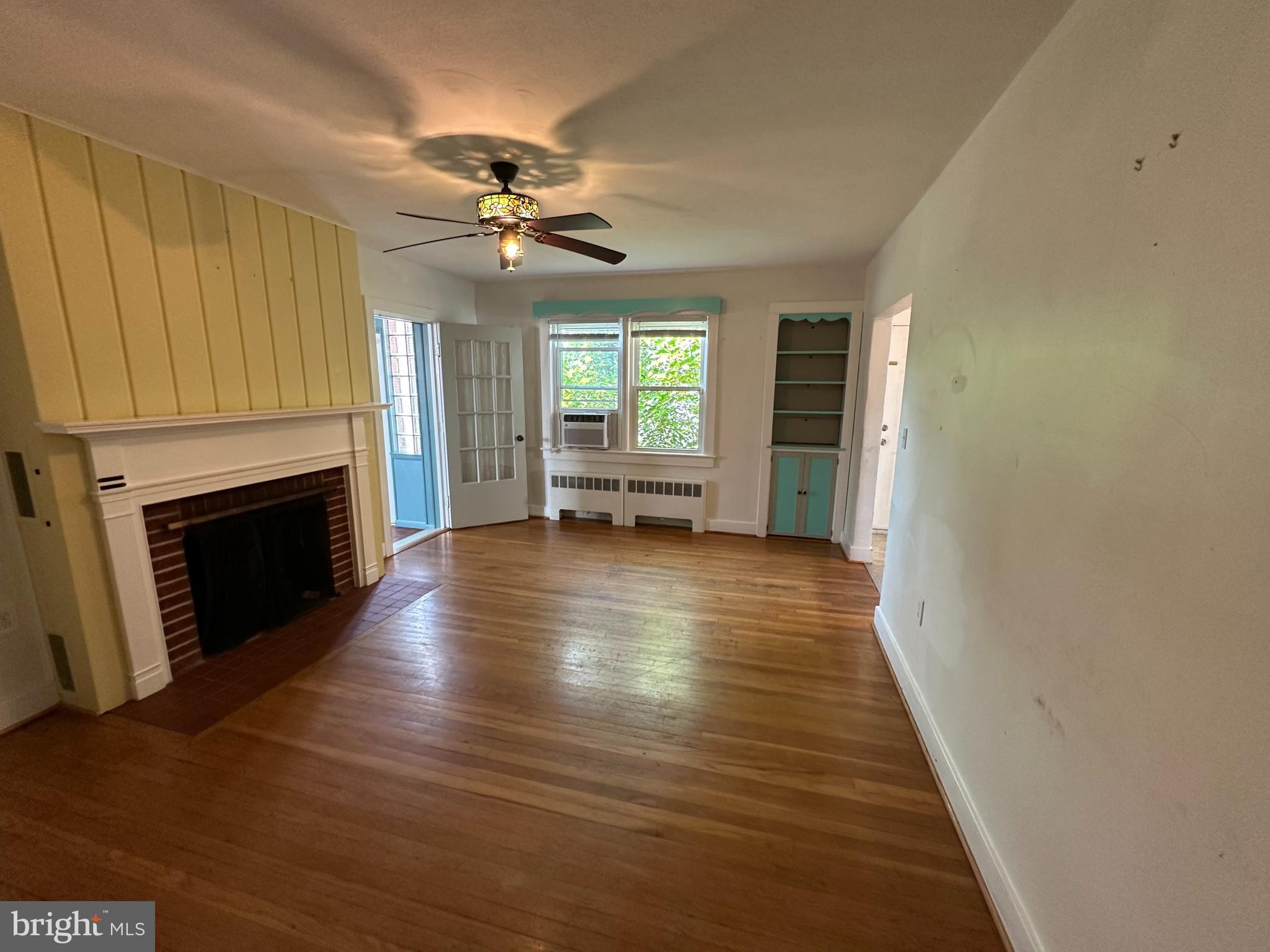 2 Terrace Lane Luray, VA 22835 - Photo 8 of 35 a view of a livingroom with wooden floor a ceiling fan and staircase