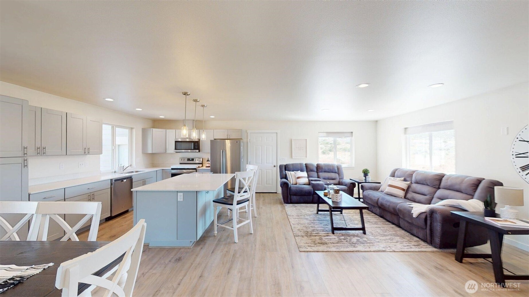 212 Hubbard Road Riverside, WA 98849 - Photo 14 of 39 a living room with lots of furniture and kitchen view