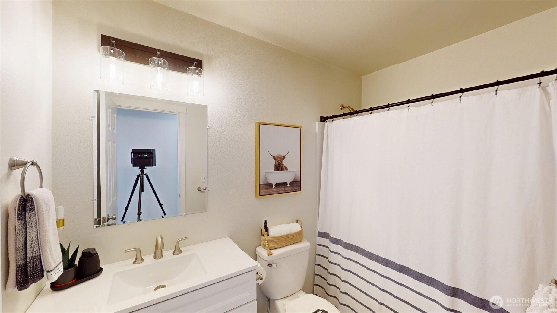 212 Hubbard Road Riverside, WA 98849 - Photo 21 of 39 a bathroom with a sink a toilet and a mirror