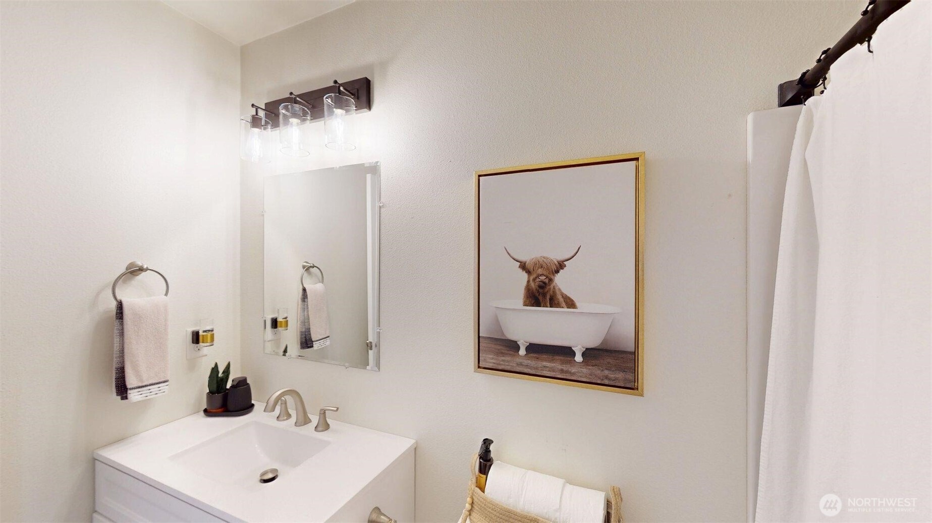 212 Hubbard Road Riverside, WA 98849 - Photo 22 of 39 a bathroom with a sink and a mirror