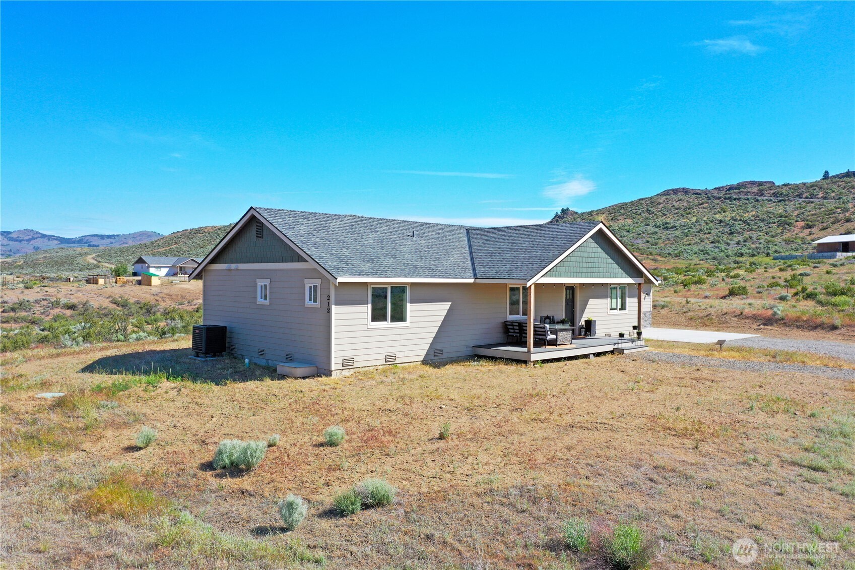 212 Hubbard Road Riverside, WA 98849 - Photo 3 of 39 a view of a house with a yard