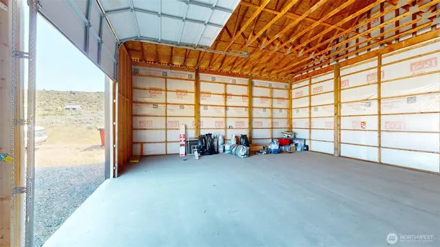 a view of a big room with air conditioner and bed