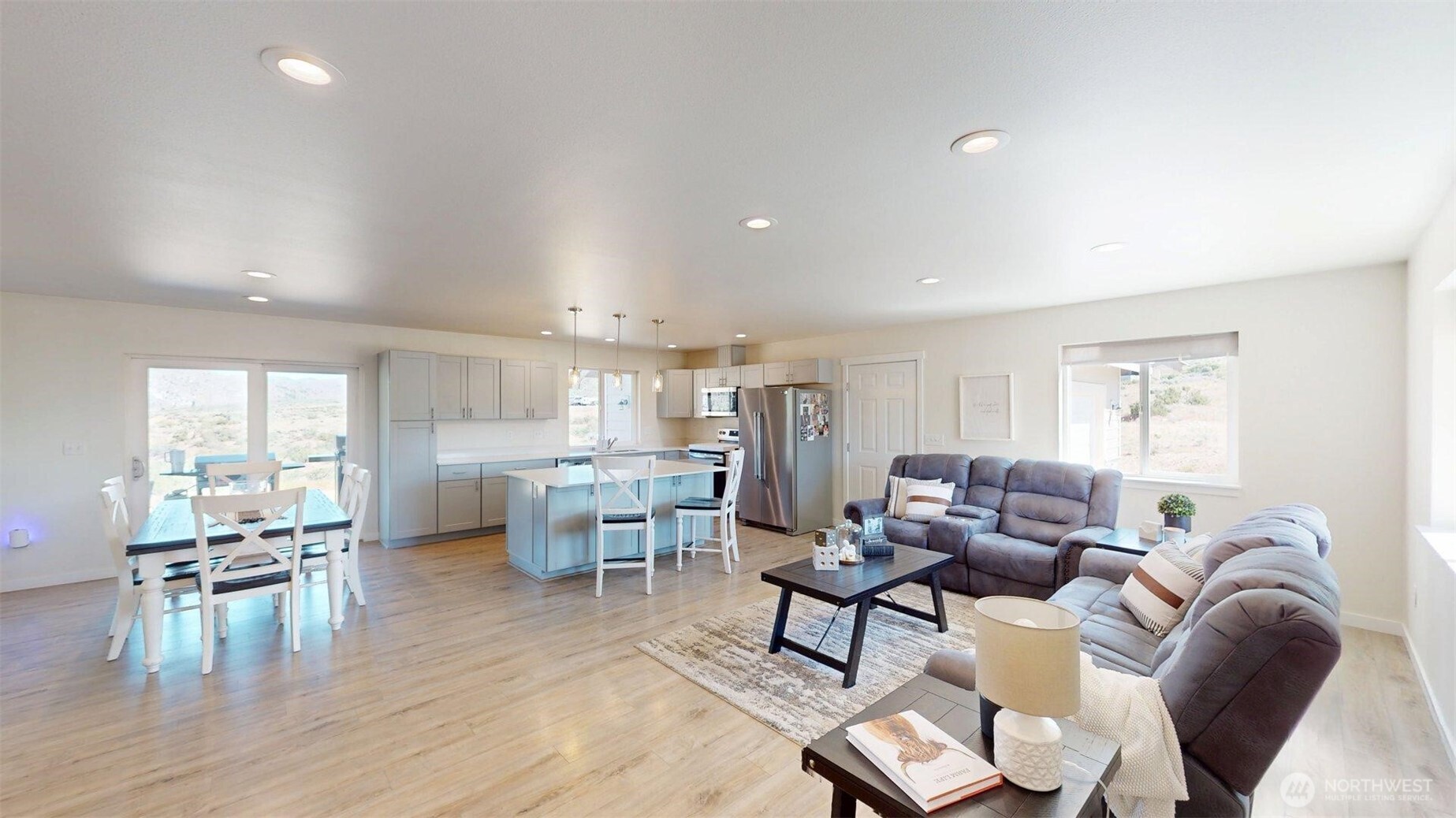 212 Hubbard Road Riverside, WA 98849 - Photo 6 of 39 a living room with furniture or kitchen and a wooden floor