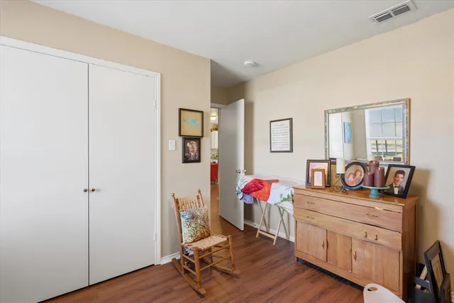 a room with furniture and a flat screen tv