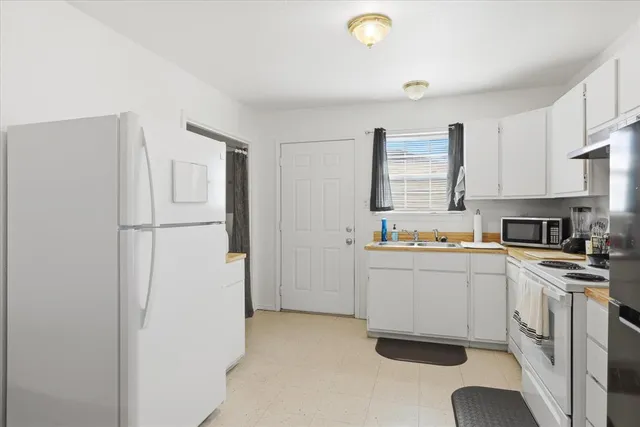 a storage room with washer and dryer