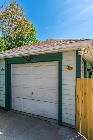 a patio with table and chairs