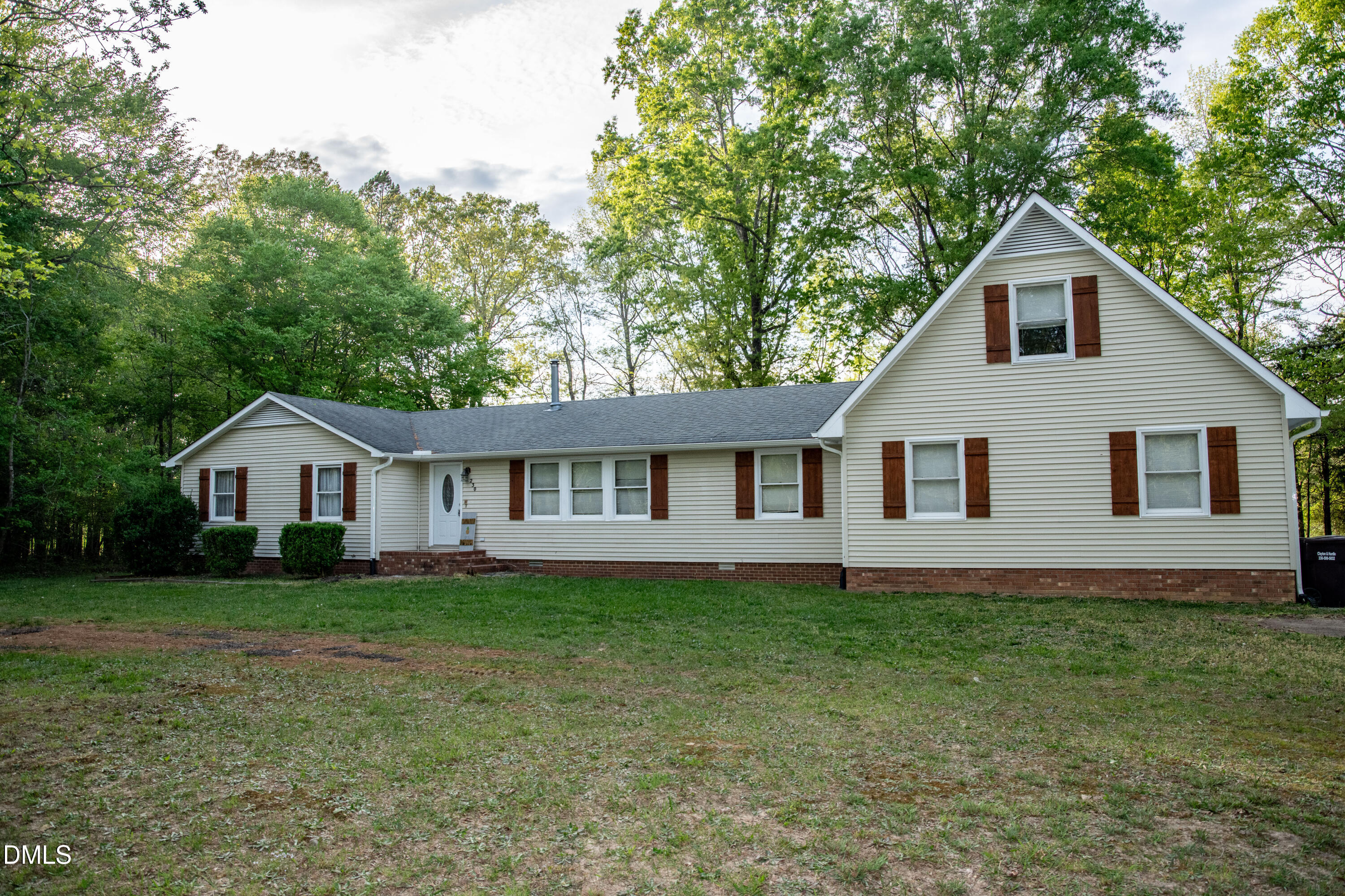 230 Hillsborough Road Timberlake, NC 27583 - Photo 1 of 15 a view of a house with a yard