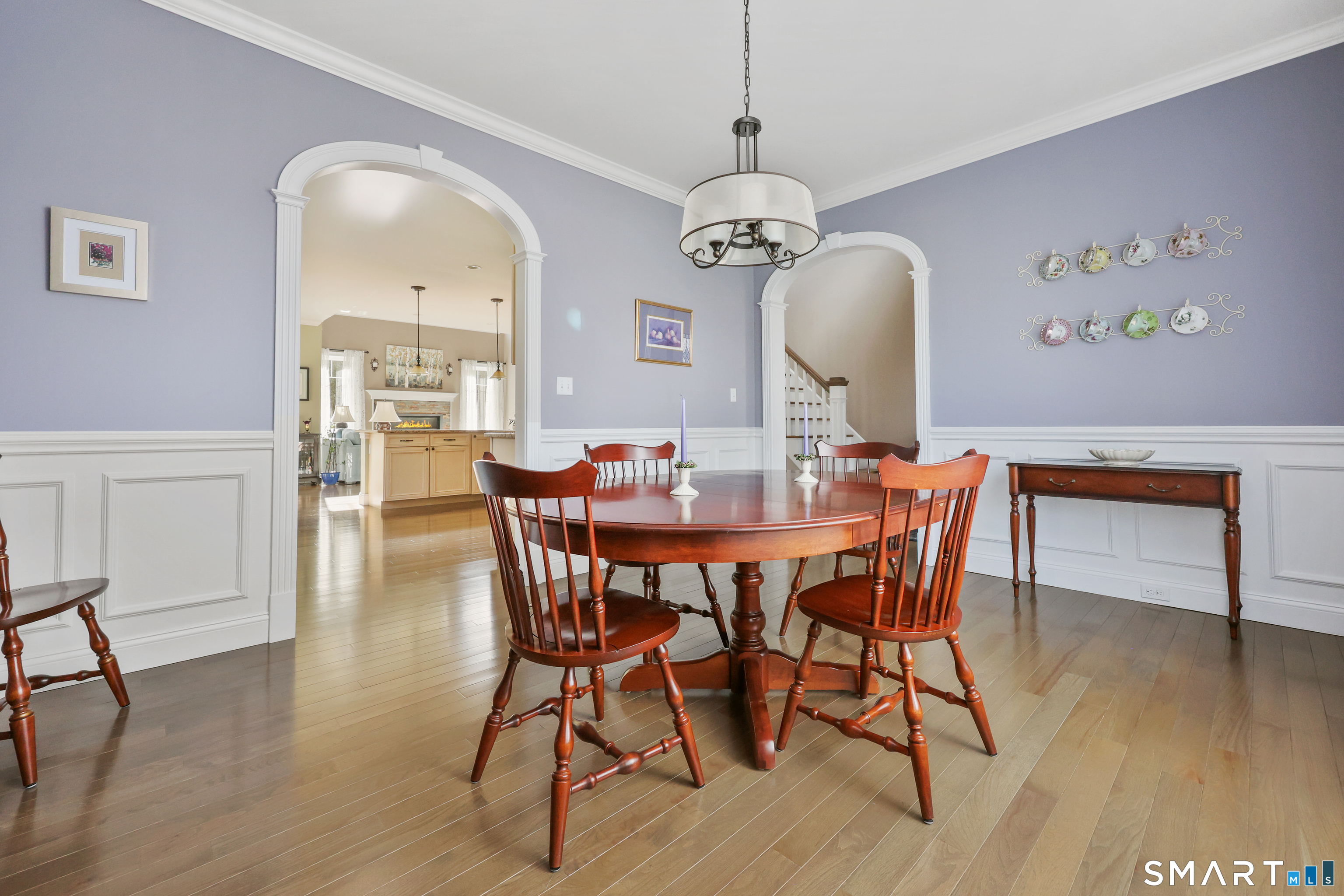 20 Lakeview Estates, Unit 20 Middlefield, CT 06455 - Photo 15 of 36 a view of a dining room with furniture wooden floor and chandelier
