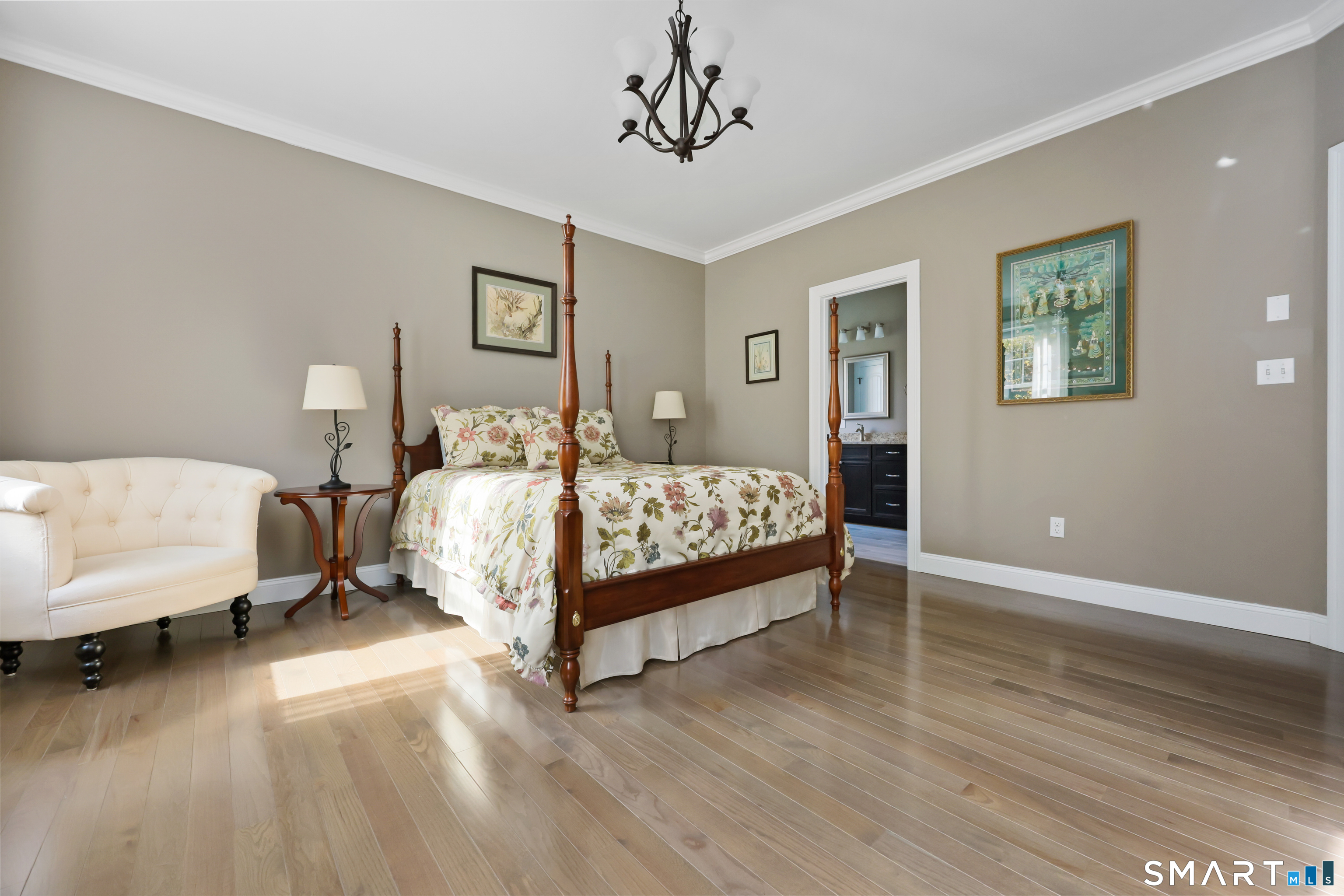 20 Lakeview Estates, Unit 20 Middlefield, CT 06455 - Photo 17 of 36 a bedroom with a bed and painting on the wall
