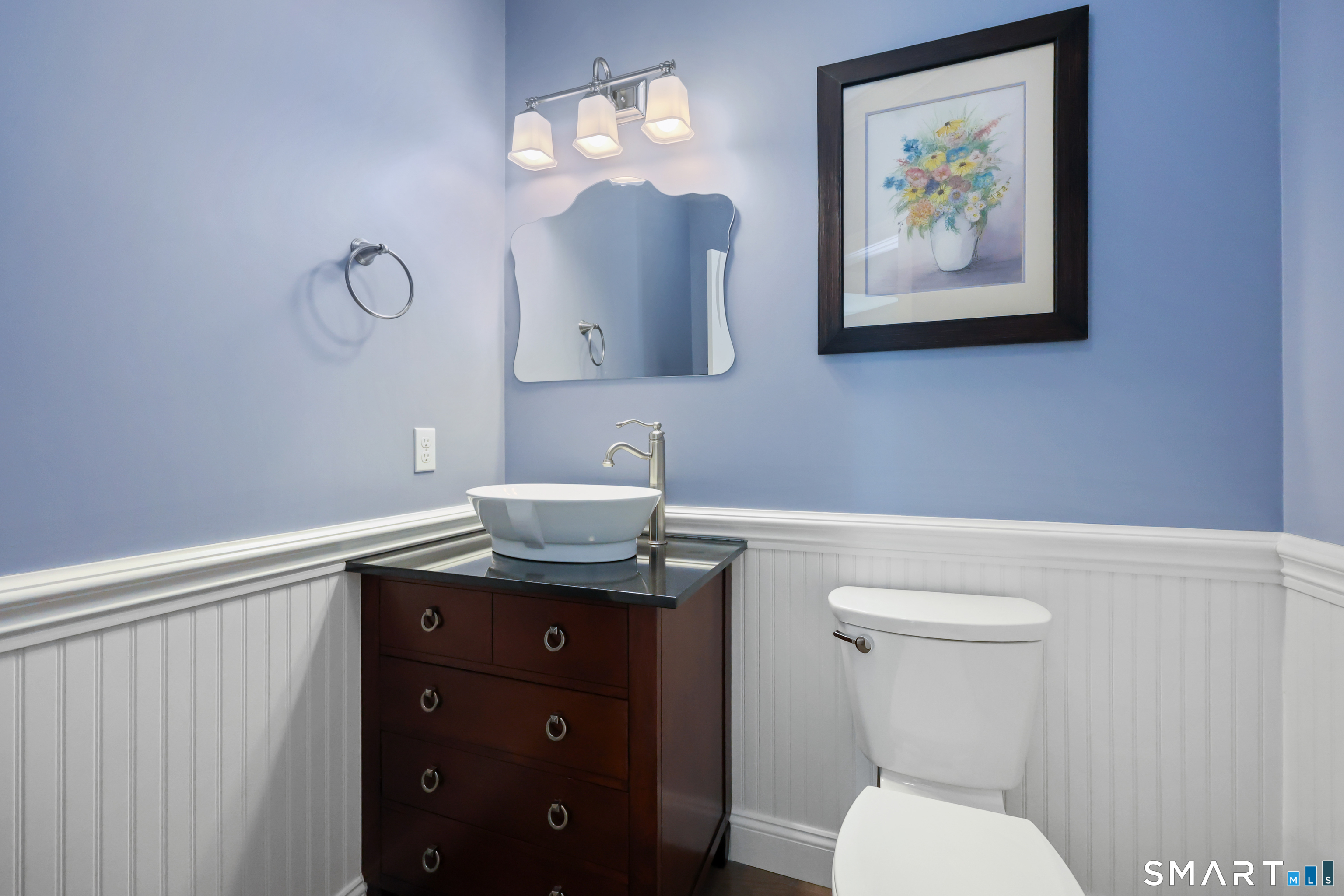 20 Lakeview Estates, Unit 20 Middlefield, CT 06455 - Photo 22 of 36 a bathroom with a toilet a sink and mirror