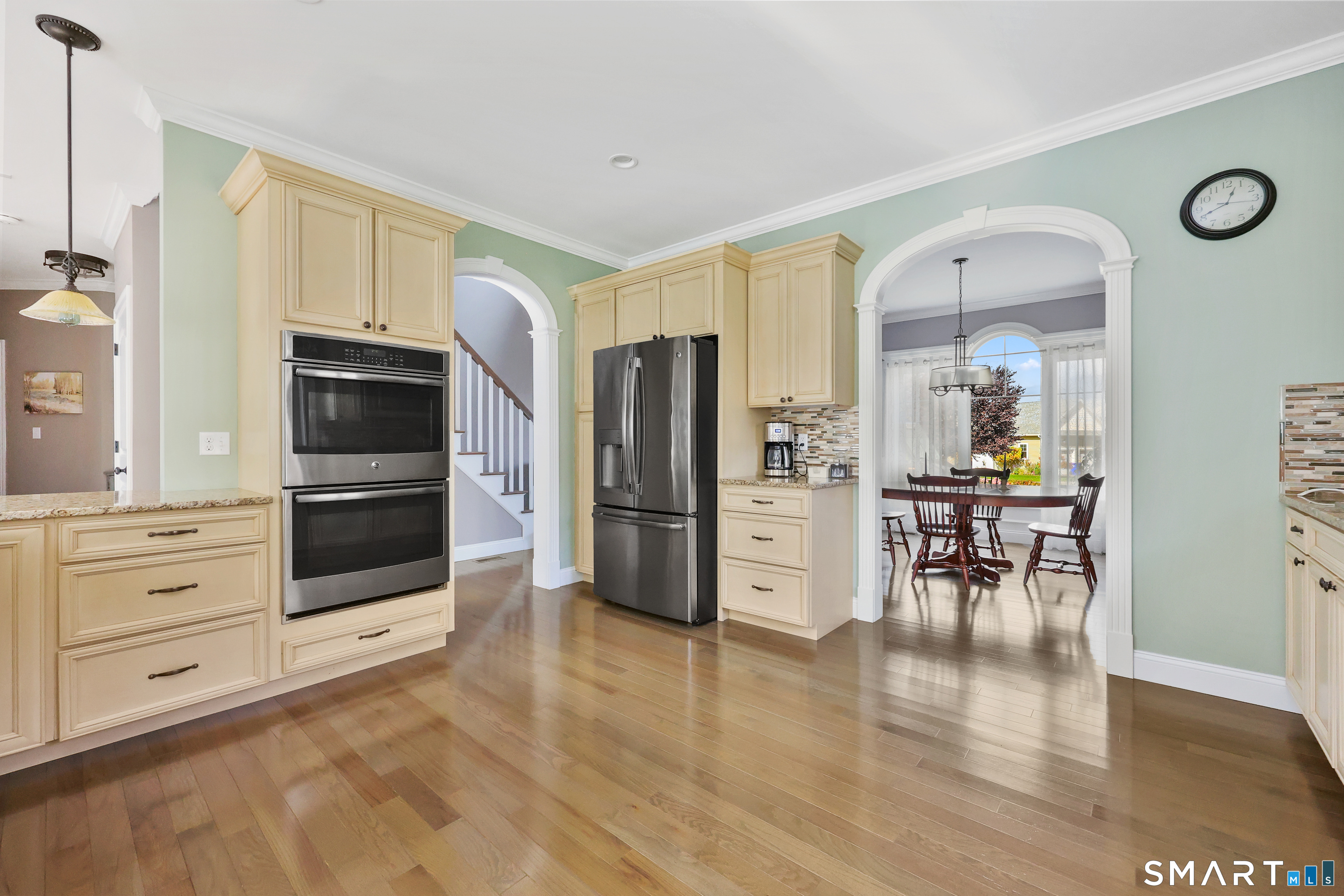 20 Lakeview Estates, Unit 20 Middlefield, CT 06455 - Photo 5 of 36 a kitchen with stainless steel appliances a refrigerator and a stove top oven