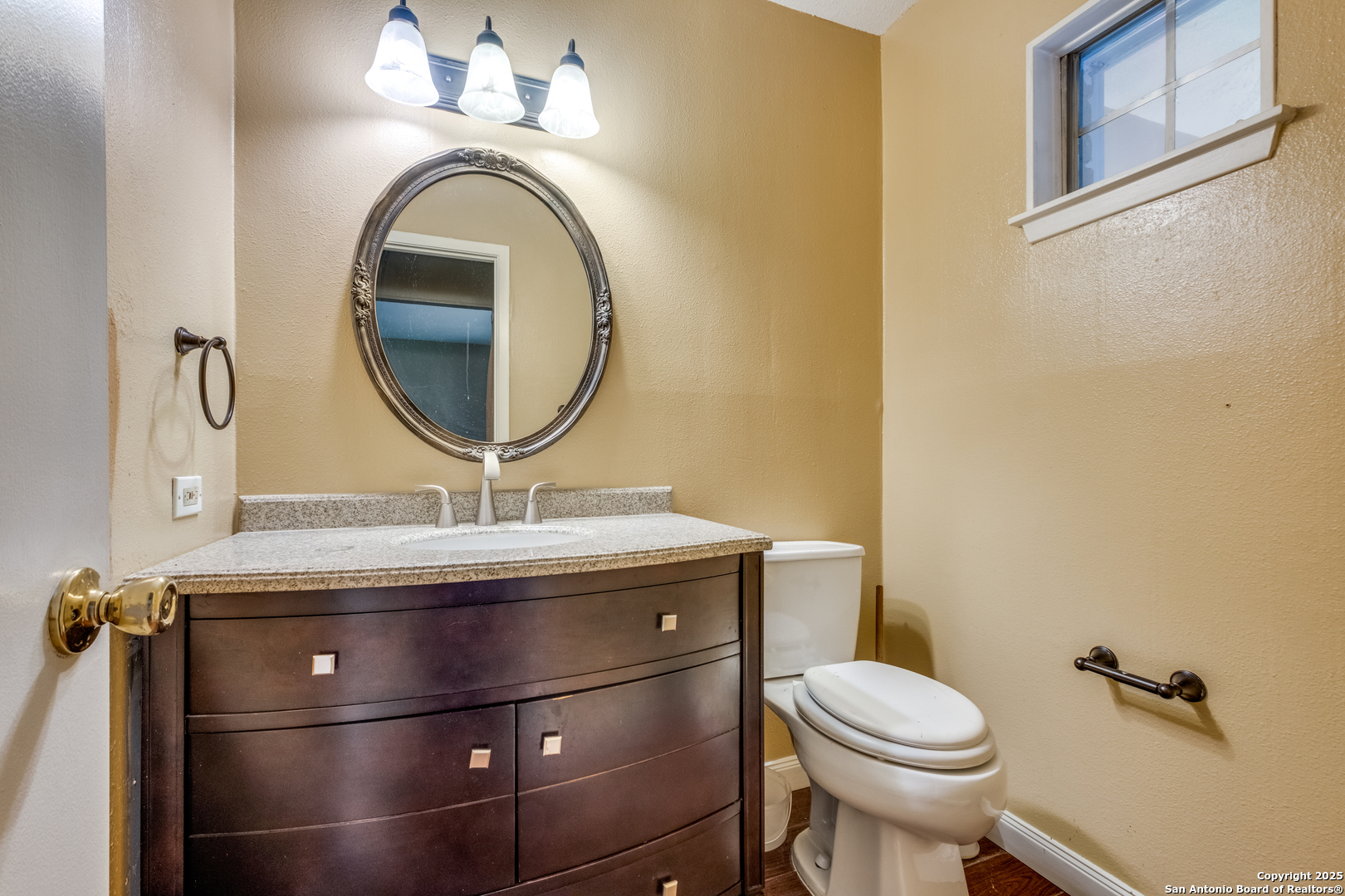6106 Vance Jackson Road, Unit 46 San Antonio, TX 78230 - Photo 20 of 25 a bathroom with a toilet and a sink