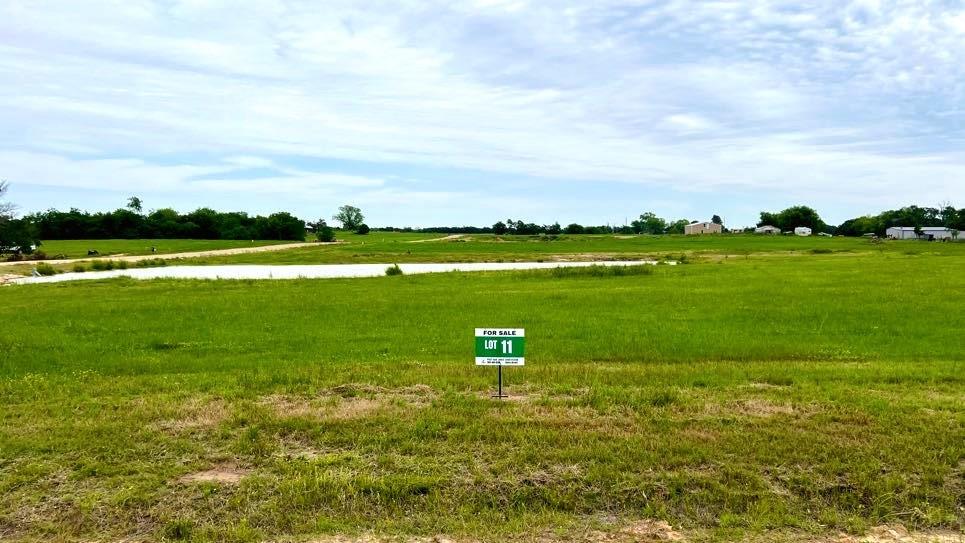 Lot 11 Fm514 Road Yantis, TX 75497 - Photo 1 of 6 a view of a lake with houses in the back