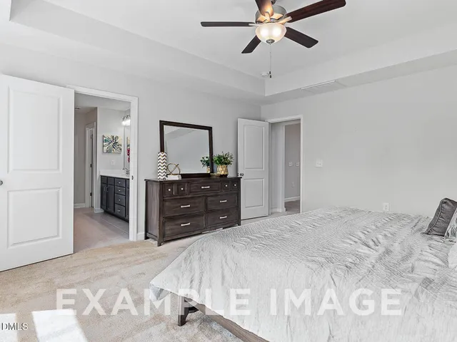 a bathroom with a sink vanity and a mirror