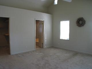 2160 Waltzer Road Santa Rosa, CA 95403 - Photo 6 of 9 an empty room with chandelier fan and windows