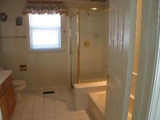2160 Waltzer Road Santa Rosa, CA 95403 - Photo 7 of 9 a bathroom with a granite countertop sink a toilet and shower