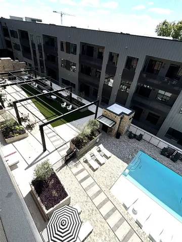 a outdoor space with lots of white furniture