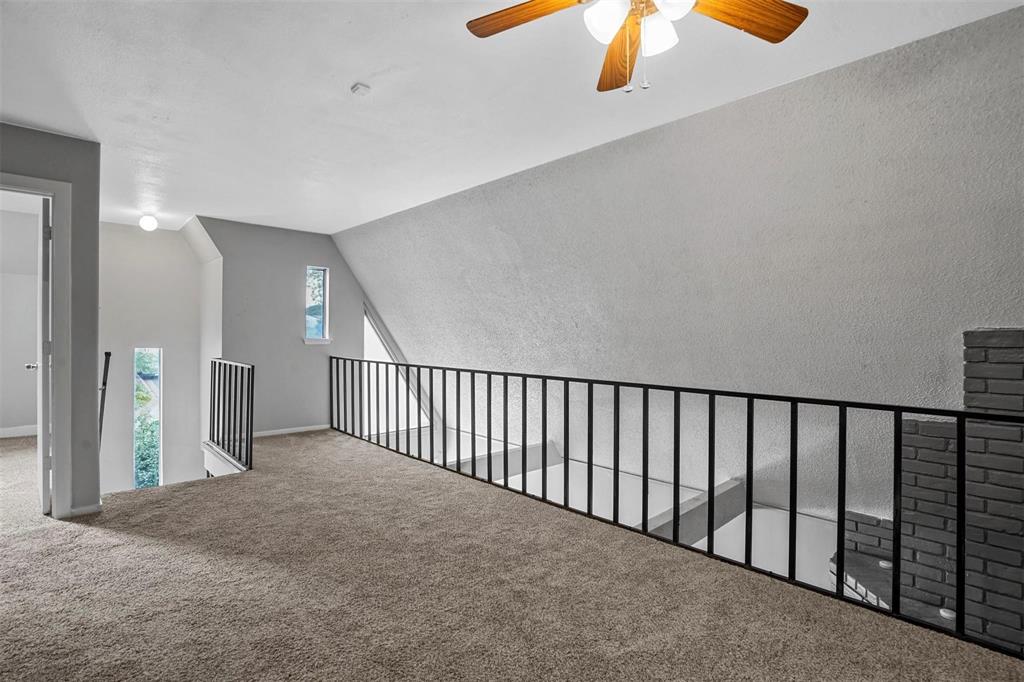 2156 Fleur De Lis Court Arlington, TX 76012 - Photo 8 of 16 a view of a hallway
