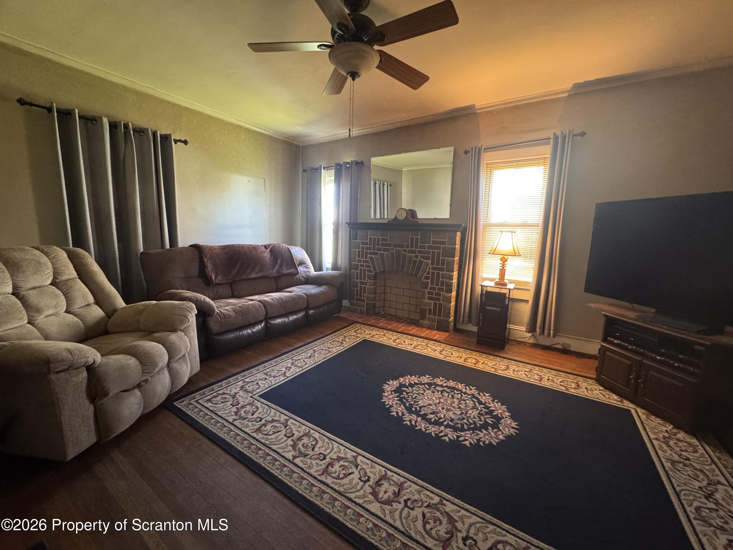 409 East Warren Street Dunmore, PA 18512 - Photo 8 of 19 a living room with furniture rug and window