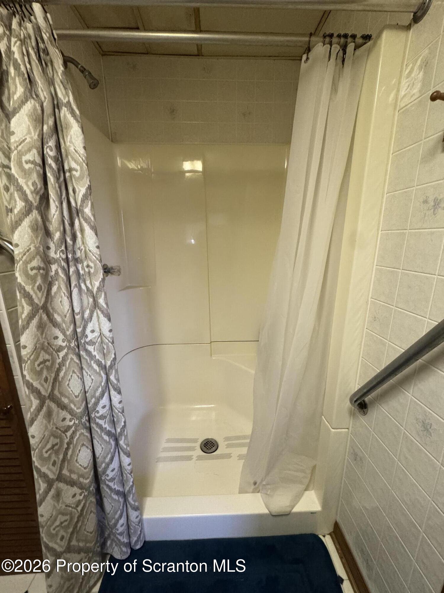 409 East Warren Street Dunmore, PA 18512 - Photo 10 of 19 a bathroom with a shower