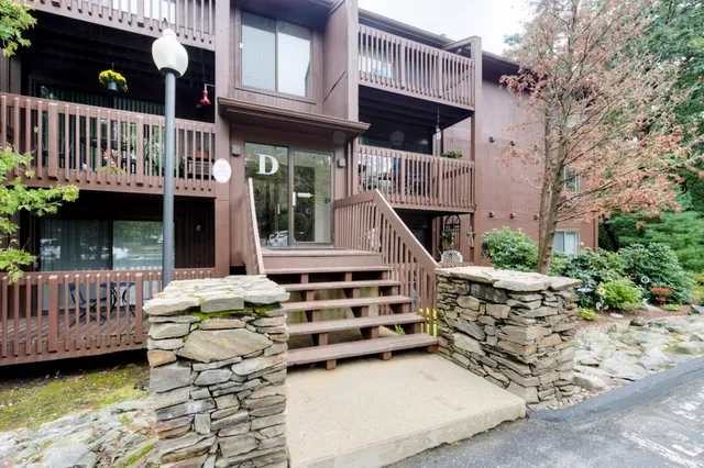 a view of house with patio outdoor seating