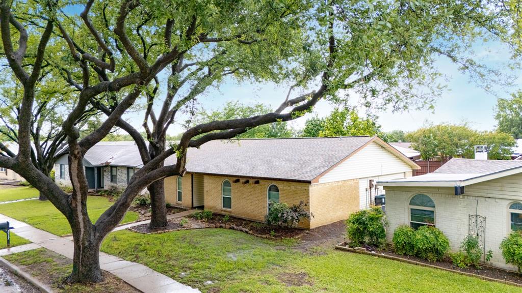 3117 Falkland Road Carrollton, TX 75007 - Photo 1 of 1 a view of house with a yard
