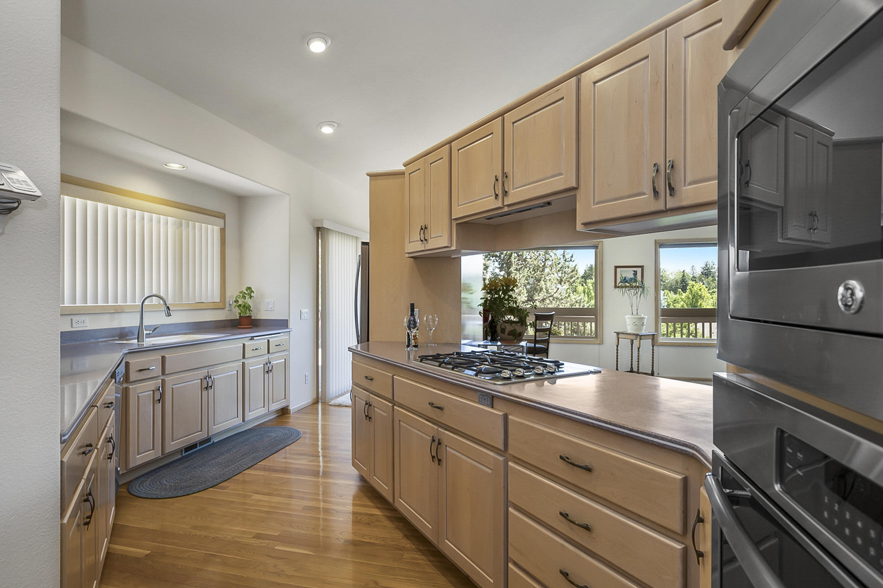 61524 Southeast Hill Ridge Road Bend, OR 97702 - Photo 12 of 49 Gas stove top, microwave, oven and dishwasher stay