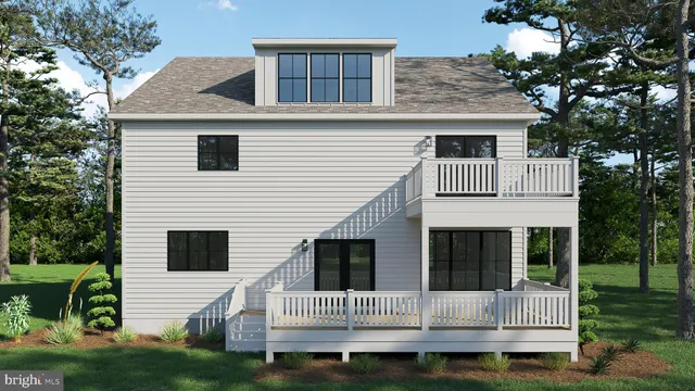 a view of house with a yard and a large tree