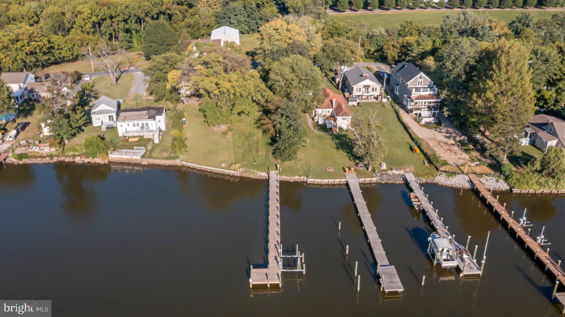 1158 East Riverside Avenue Essex, MD 21221 - Photo 4 of 12 an aerial view of residential houses with outdoor space