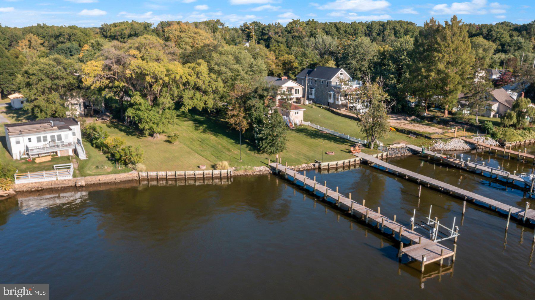 1158 East Riverside Avenue Essex, MD 21221 - Photo 5 of 12 an aerial view of residential houses with outdoor space