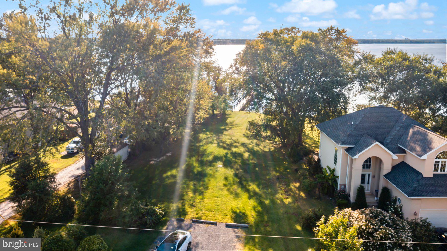 1158 East Riverside Avenue Essex, MD 21221 - Photo 8 of 12 a view of a house with a yard