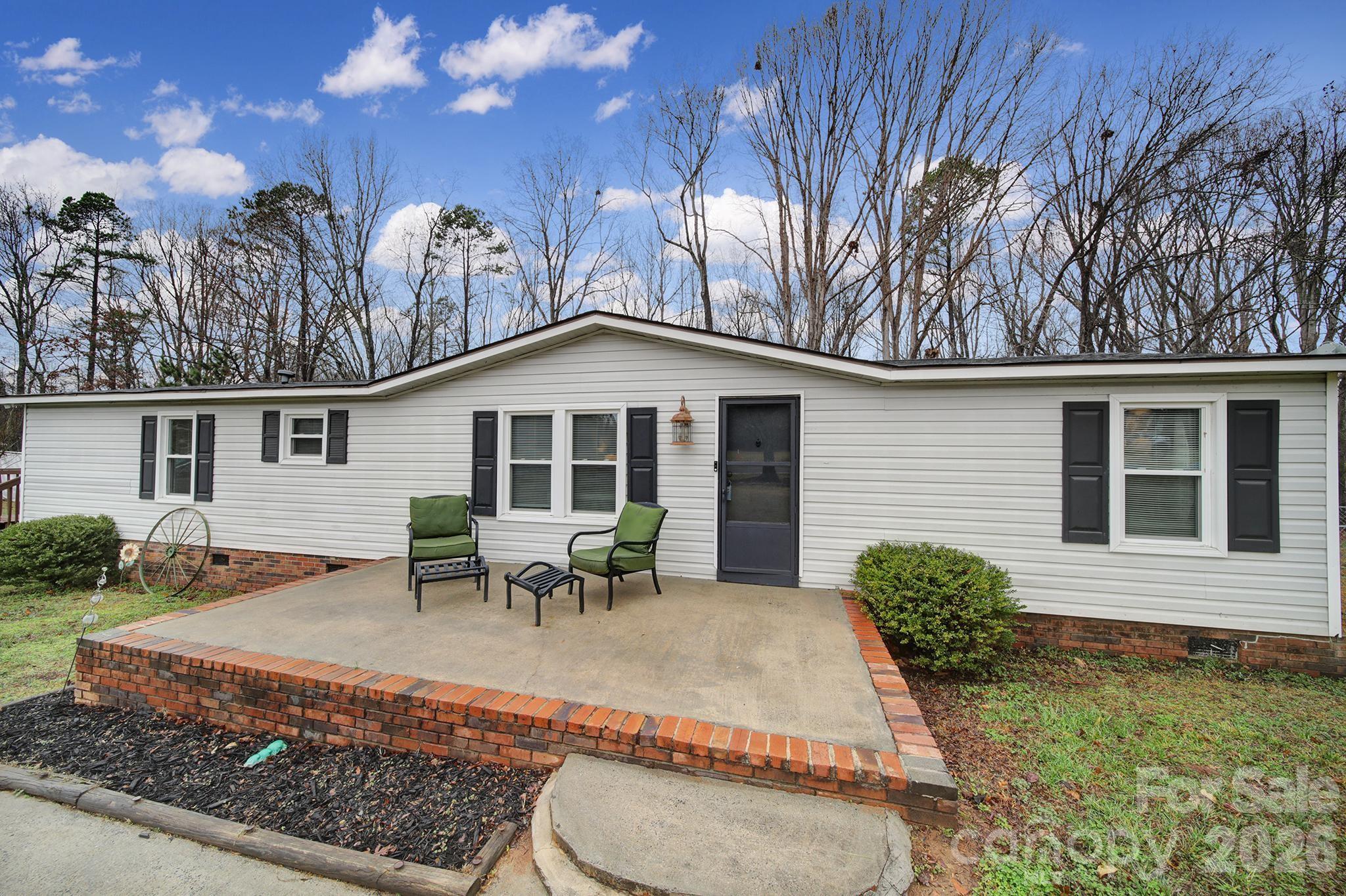3840 Sherer Road Sharon, SC 29742 - Photo 1 of 30 a view of a house with backyard and sitting area