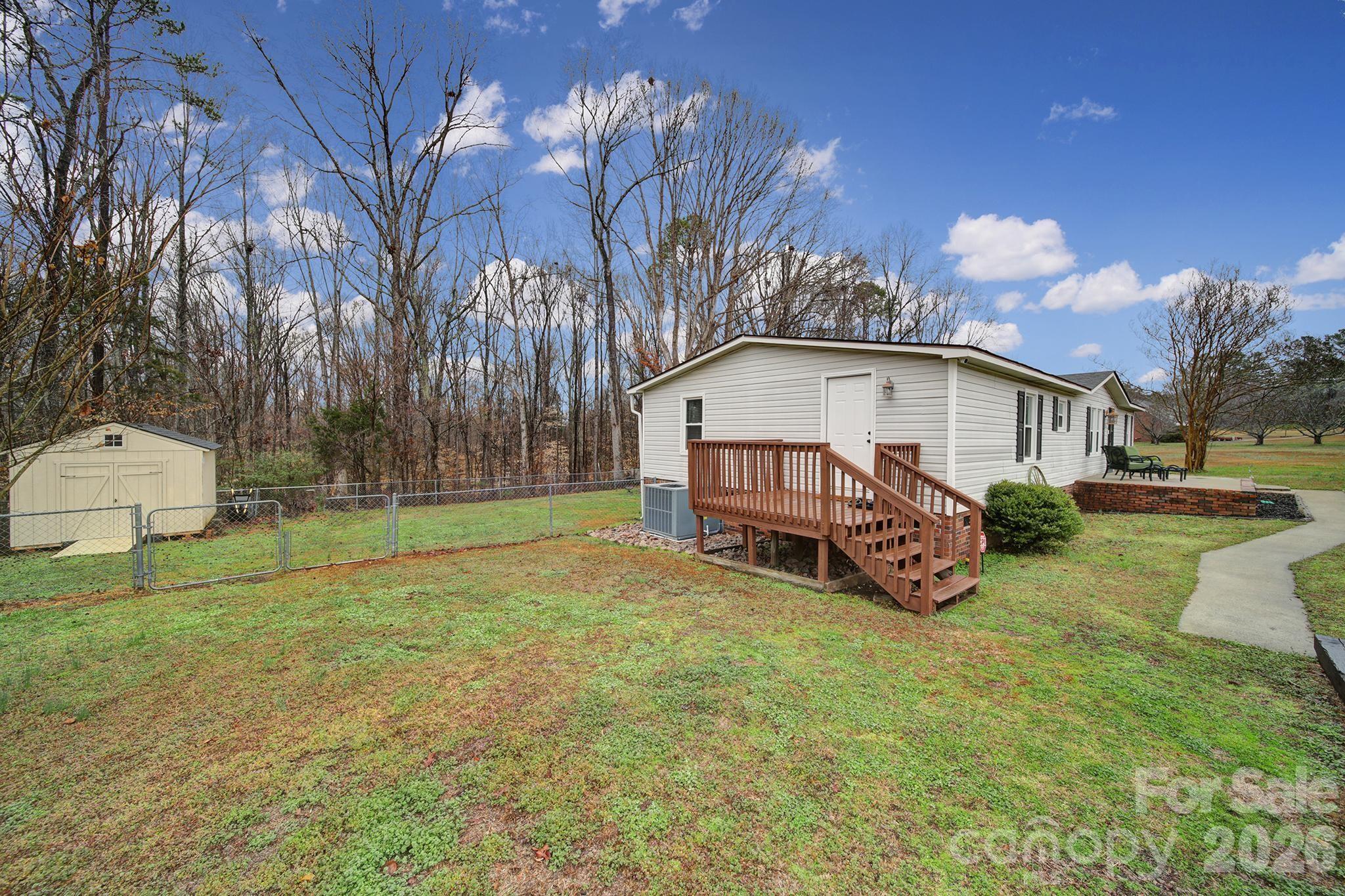 3840 Sherer Road Sharon, SC 29742 - Photo 25 of 30 a view of a house with a yard and sitting area