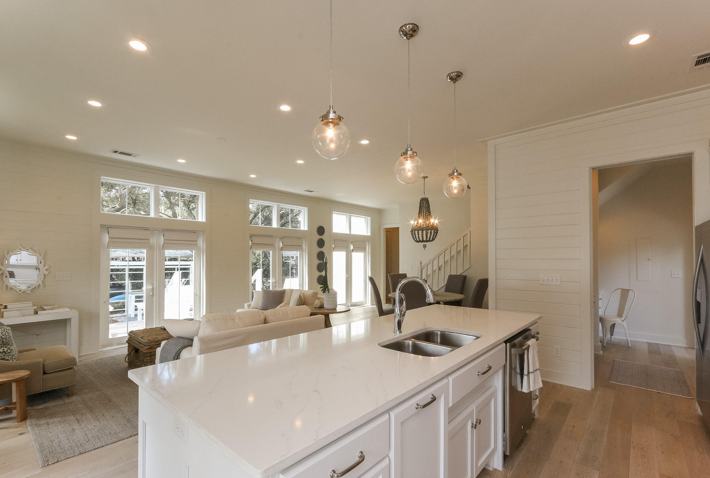 94 Blue Lake Road Santa Rosa Beach, FL 32459 - Photo 15 of 38 a large white kitchen with a large window