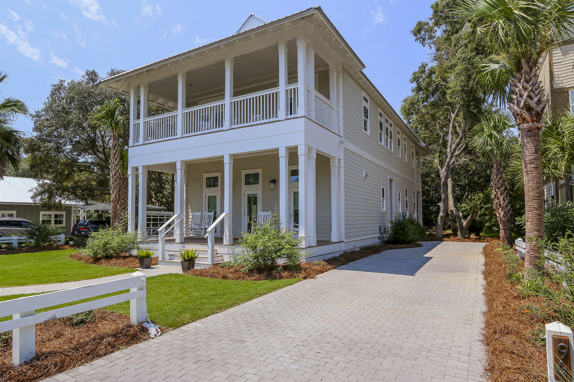 94 Blue Lake Road Santa Rosa Beach, FL 32459 - Photo 3 of 38 a front view of a house with a yard
