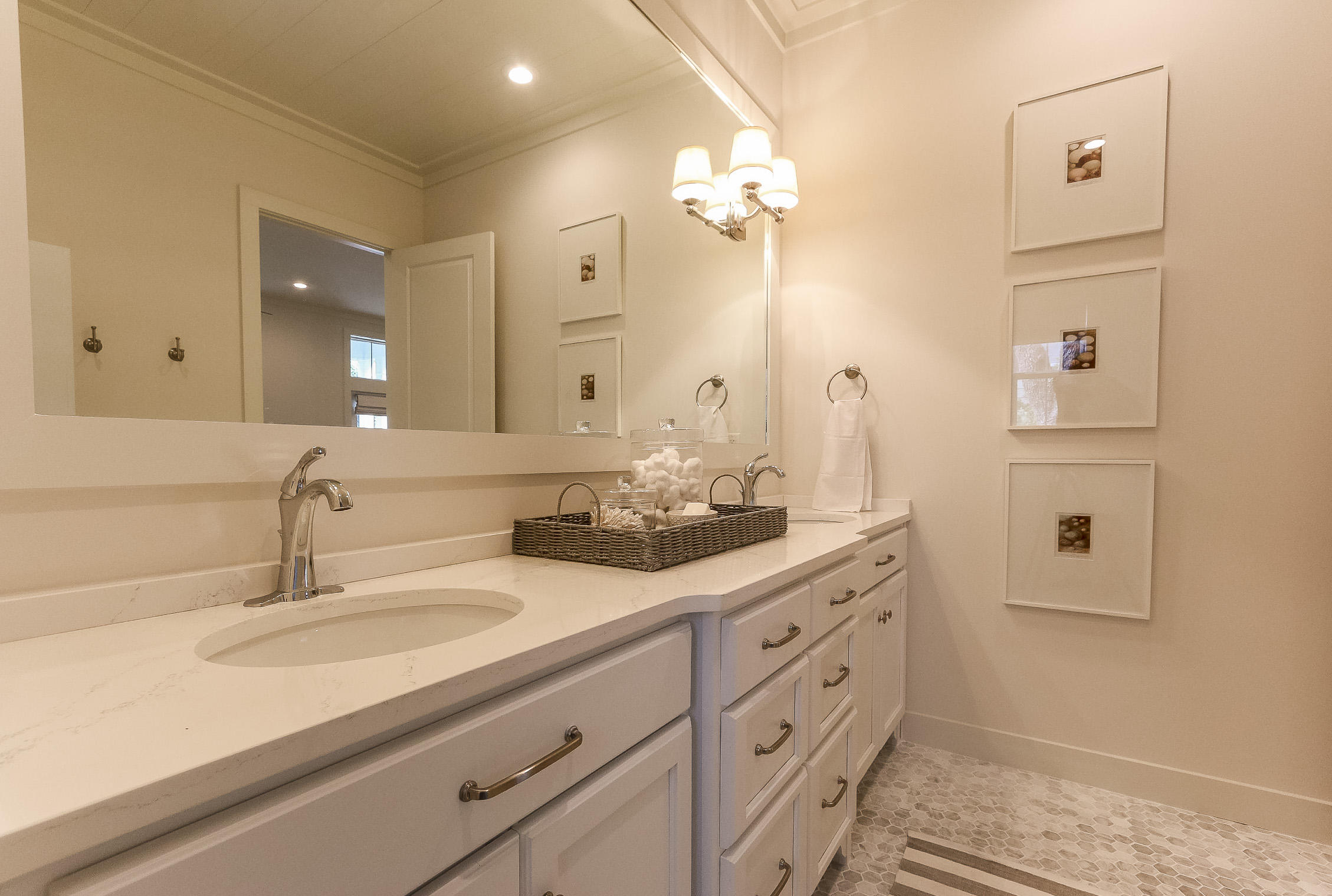 94 Blue Lake Road Santa Rosa Beach, FL 32459 - Photo 23 of 38 a bathroom with a sink double vanity and a mirror