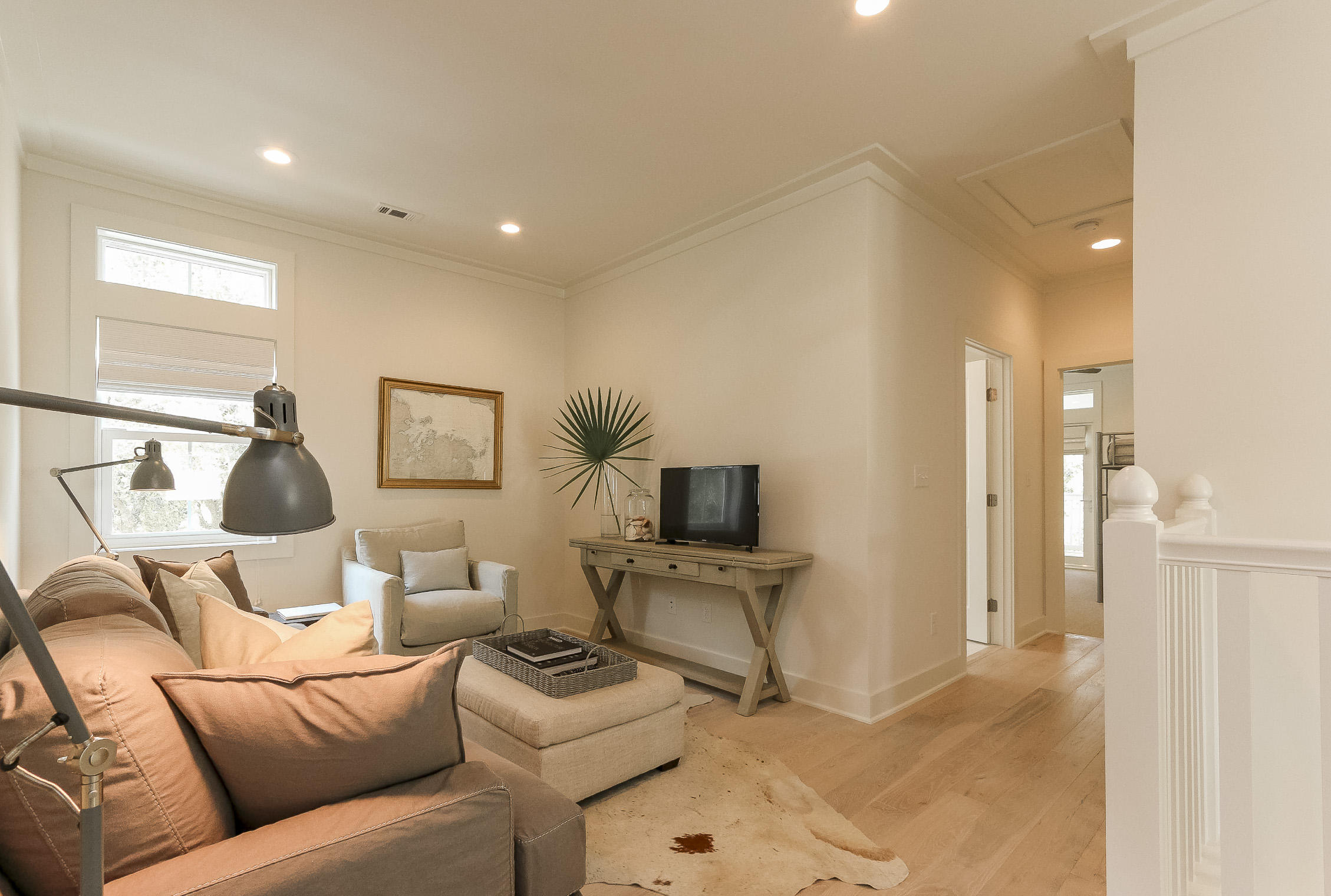 94 Blue Lake Road Santa Rosa Beach, FL 32459 - Photo 25 of 38 a living room with furniture and a flat screen tv
