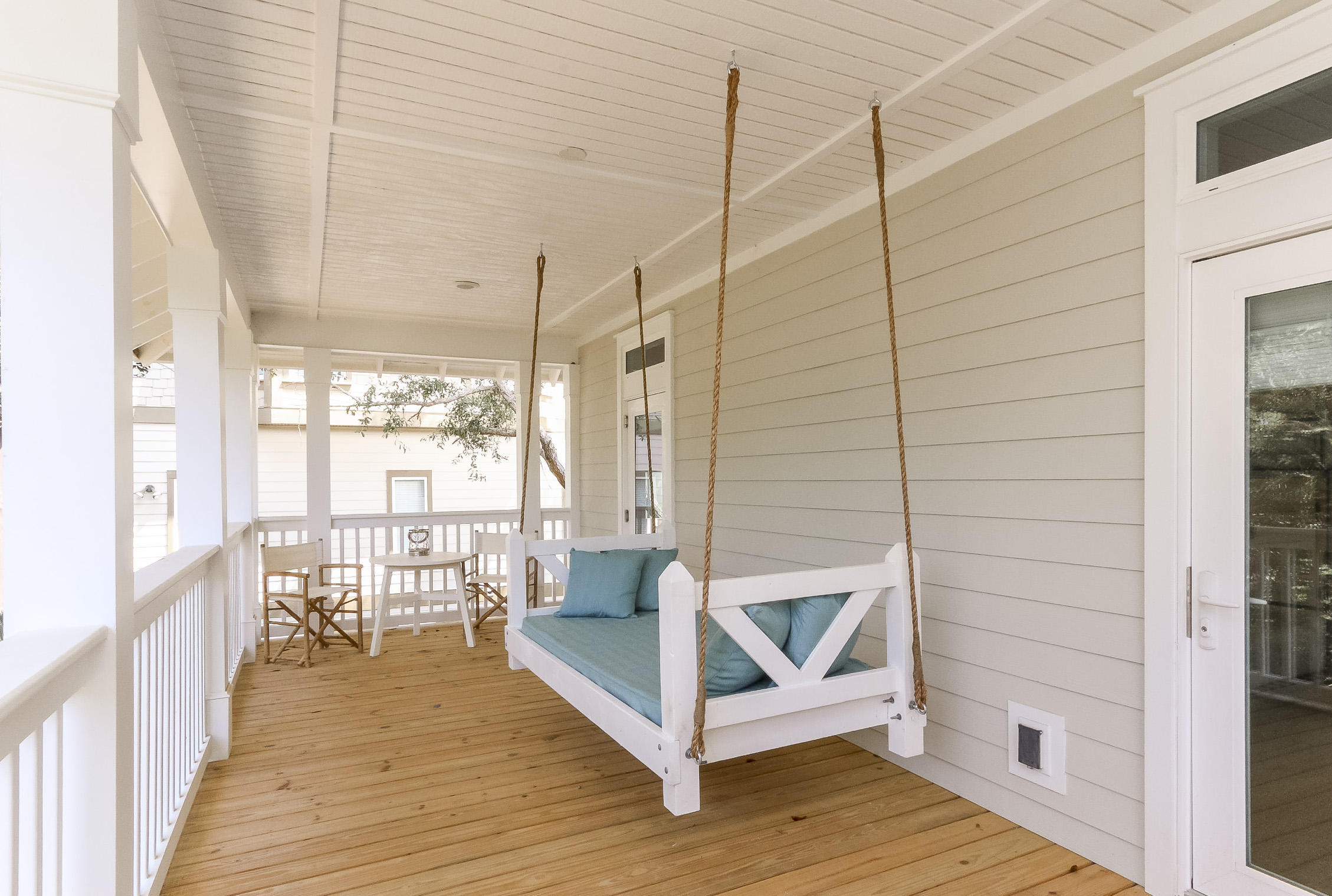 94 Blue Lake Road Santa Rosa Beach, FL 32459 - Photo 30 of 38 a view of a balcony with wooden floor