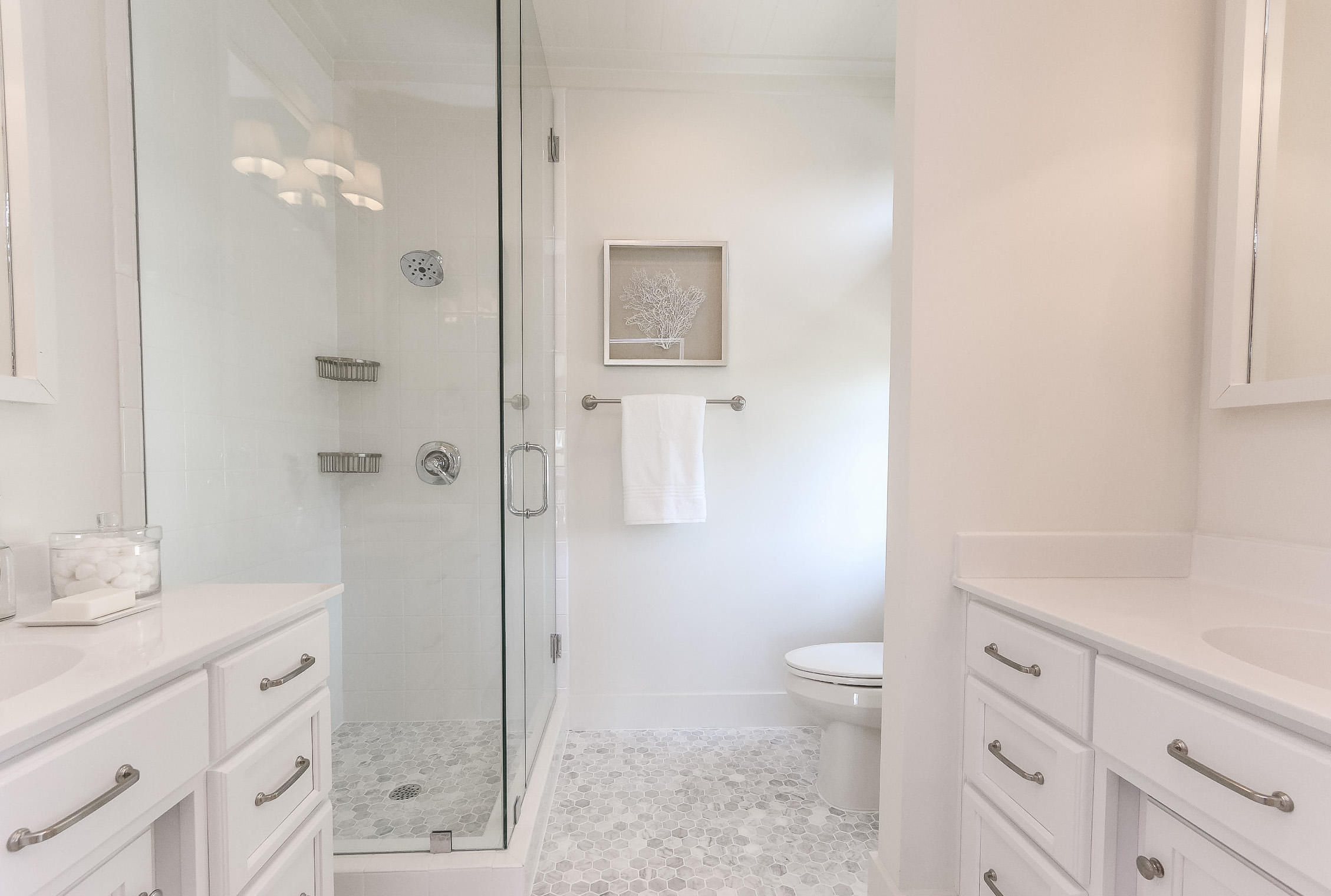 94 Blue Lake Road Santa Rosa Beach, FL 32459 - Photo 31 of 38 a bathroom with a granite countertop sink a toilet and shower