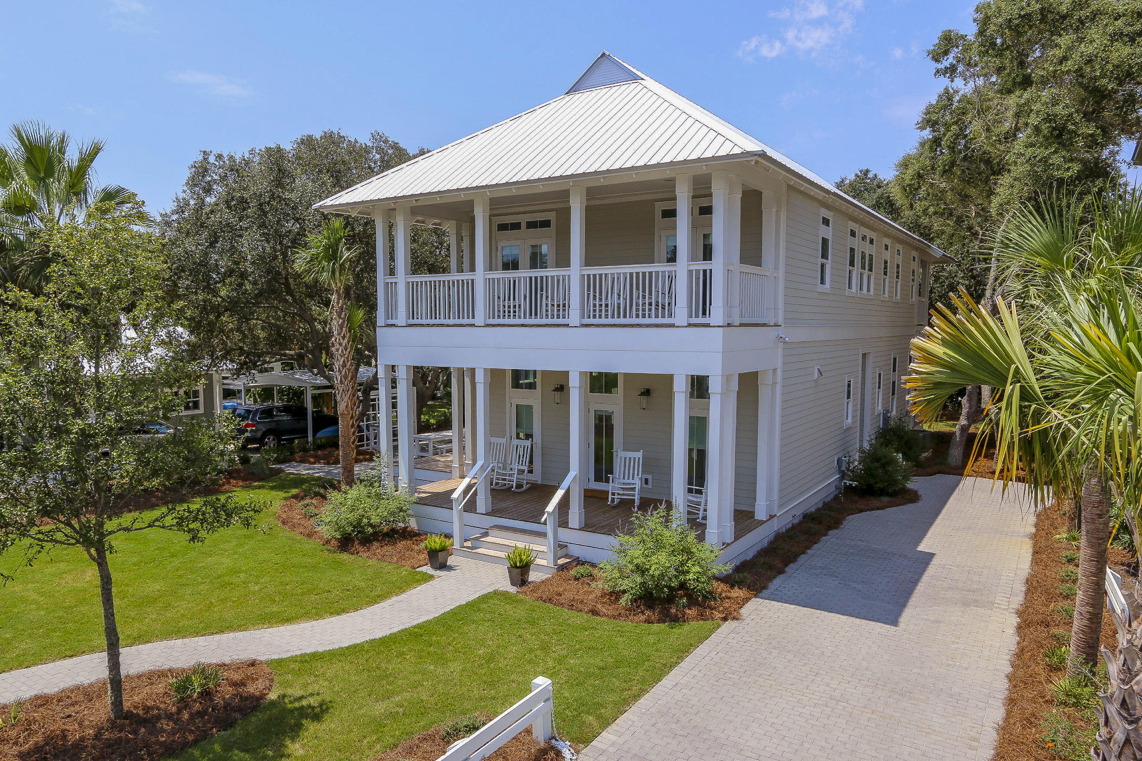94 Blue Lake Road Santa Rosa Beach, FL 32459 - Photo 5 of 38 a front view of a house with a yard