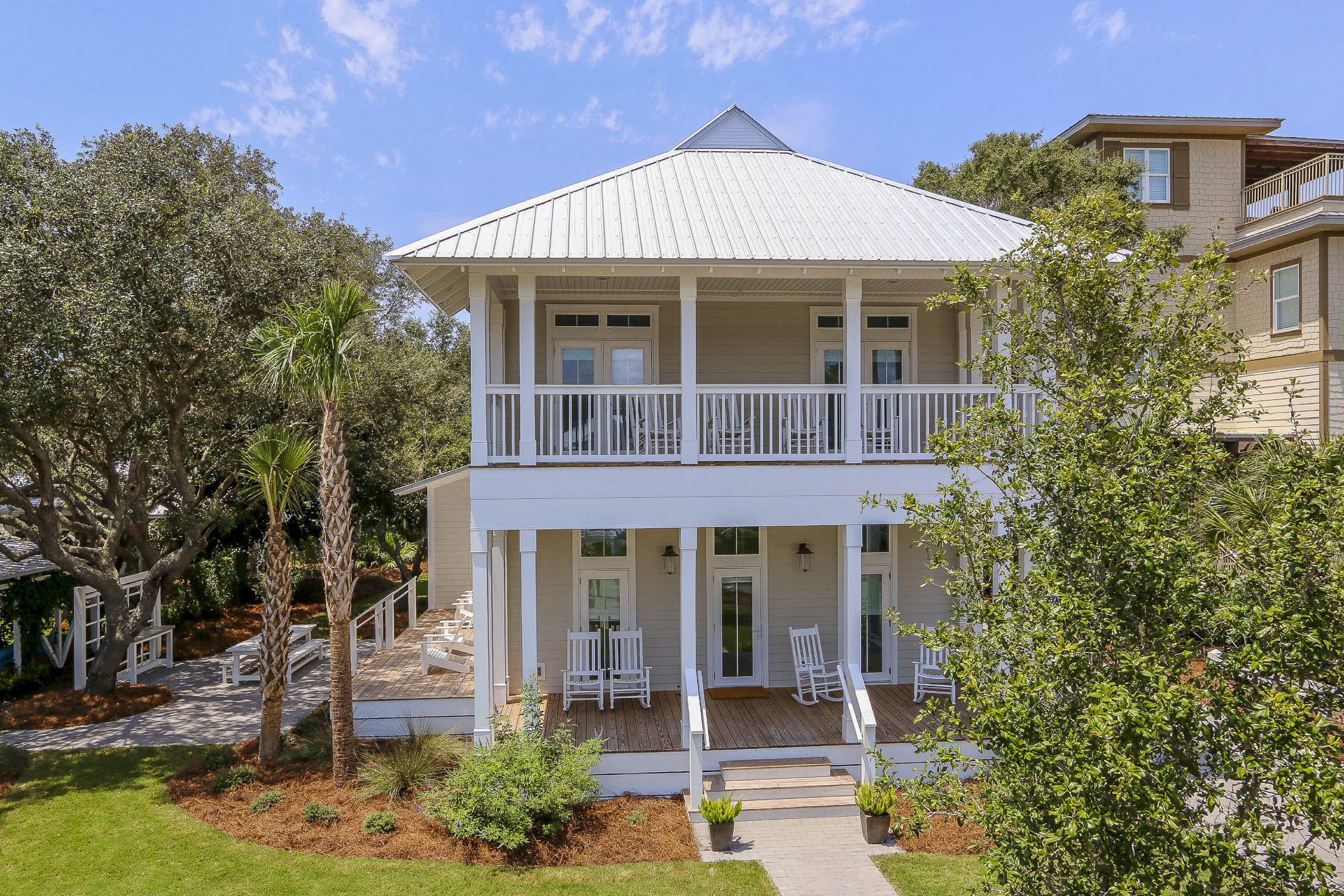 94 Blue Lake Road Santa Rosa Beach, FL 32459 - Photo 6 of 38 front view of a house with a porch