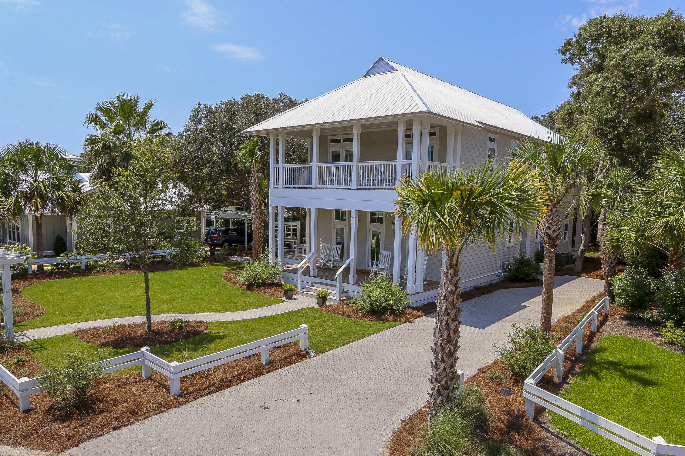 94 Blue Lake Road Santa Rosa Beach, FL 32459 - Photo 7 of 38 a front view of a house with a yard