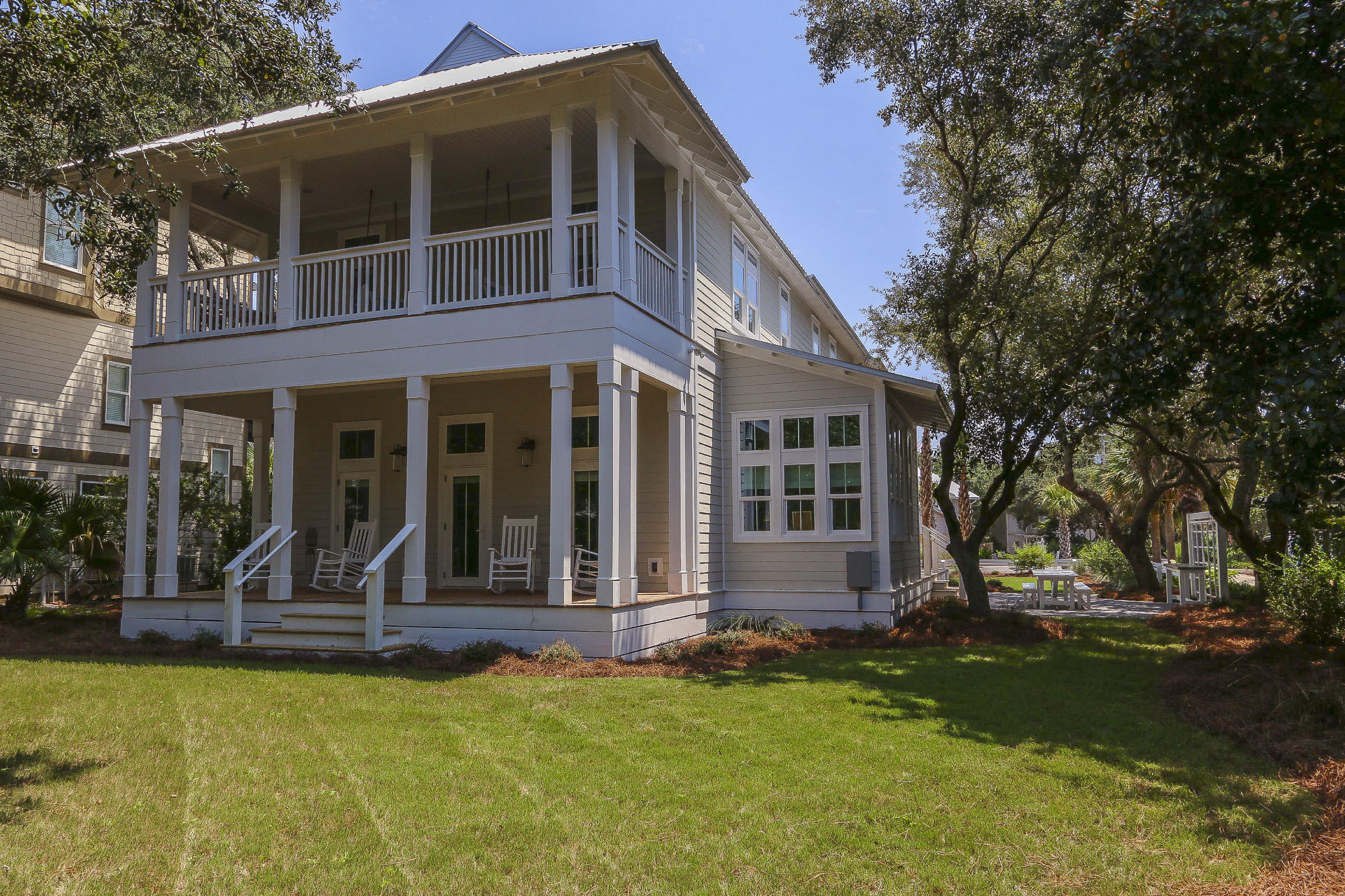 94 Blue Lake Road Santa Rosa Beach, FL 32459 - Photo 10 of 38 a front view of a house with a yard