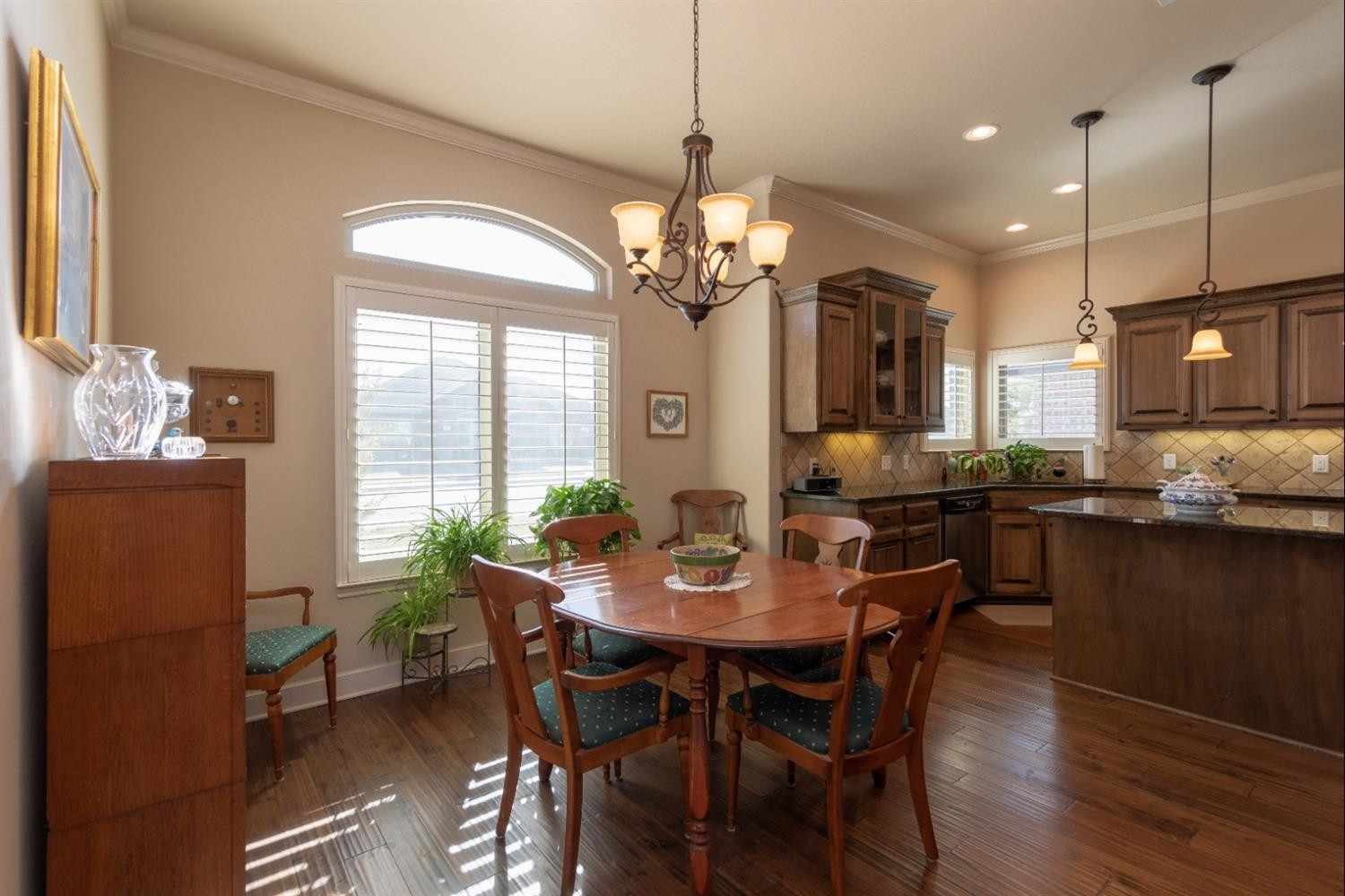 4110 124th Street Lubbock, TX 79423 - Photo 11 of 32 a view of a dining room with furniture window and wooden floor