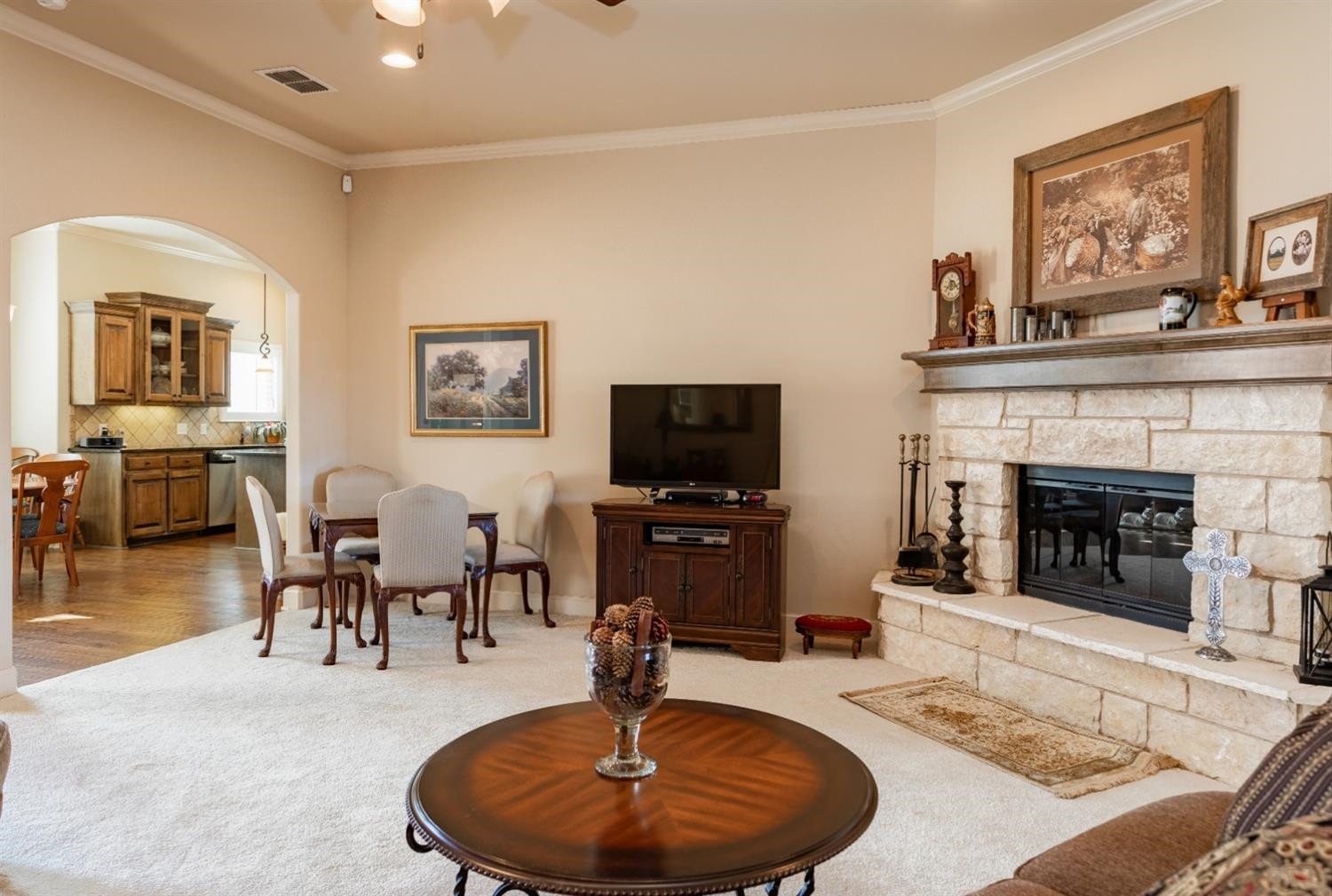 4110 124th Street Lubbock, TX 79423 - Photo 2 of 32 a living room with furniture and a fireplace