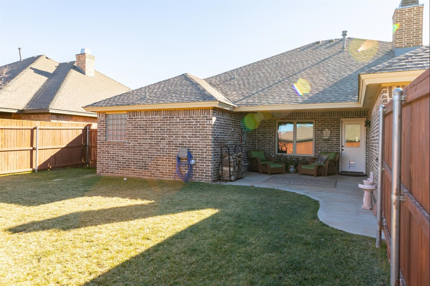 4110 124th Street Lubbock, TX 79423 - Photo 27 of 32 a view of a house with a yard