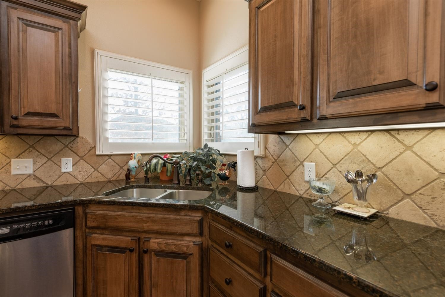4110 124th Street Lubbock, TX 79423 - Photo 8 of 32 a kitchen with a sink and cabinets