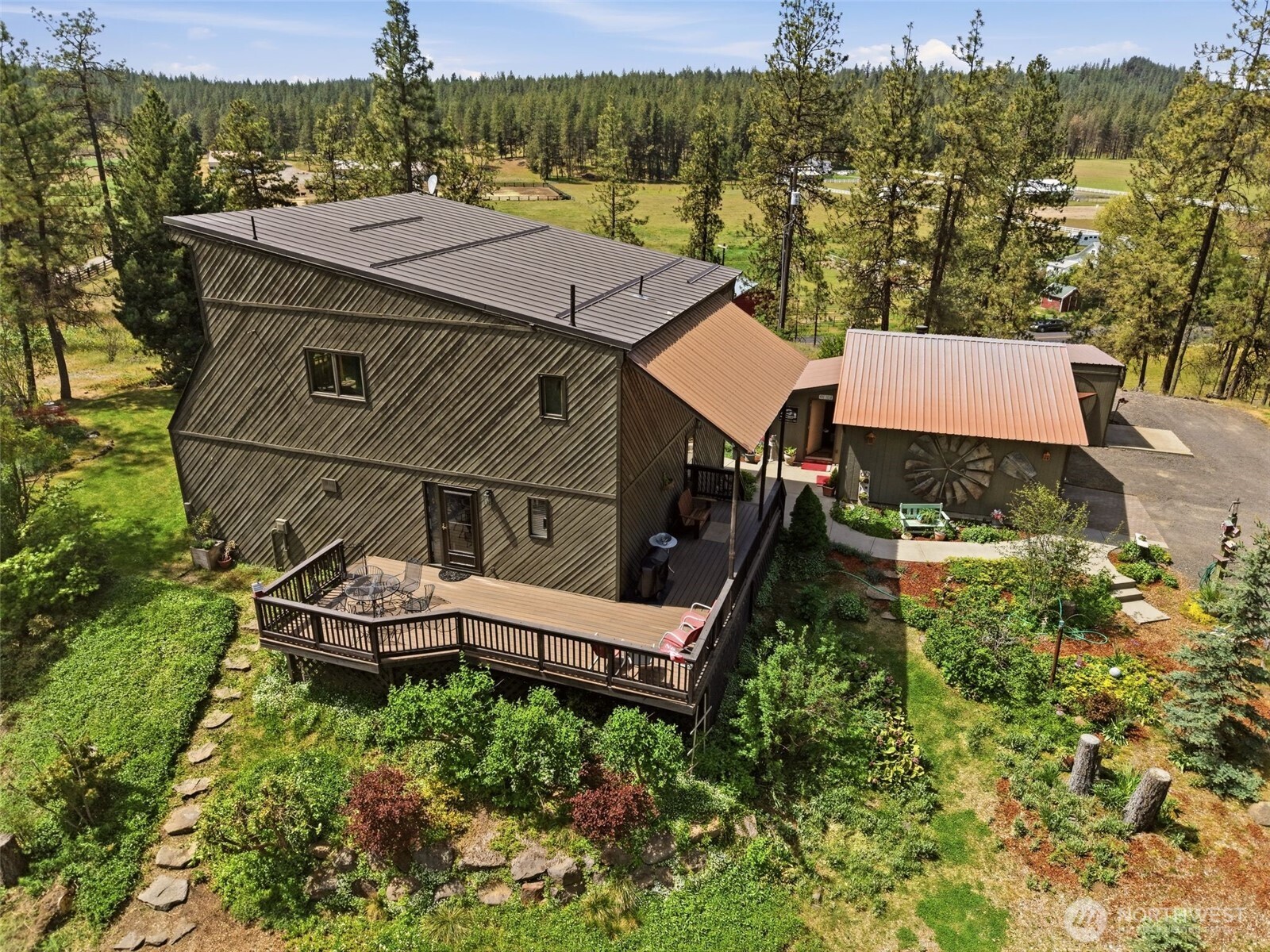 12119 South Spotted Road Cheney, WA 99004 - Photo 38 of 40 an aerial view of a house with swimming pool