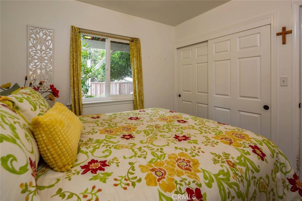 2138 Wilton Drive Cambria, CA 93428 - Photo 22 of 37 a bedroom with a bed and a window